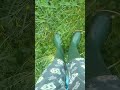 Wearing my Green Wellies in a paddling pool.