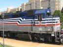 CSX Trash Train Meets Virginia Railway Express Train In Alexandria, Virginia