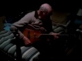 Dad playing my brother's electric guitar