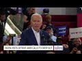 Biden defiantly says he's 'not going anywhere' in Michigan visit