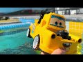 Disney Pixar Cars falling into deep pool, Lightning McQueen, Tow Mater, Mack, Sally, Francesco