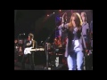 Axl Rose and Bruce Springsteen perform 