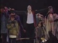 Korean fan jumps onto crane with Michael Jackson during Earth Song