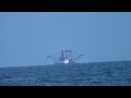 Fishing boat going over the horizon - Original speed