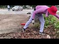 Volunteer to clean up overgrown sidewalks and smelly garbage using rudimentary tools
