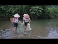 Two sisters went fishing in the stream and caught big fish and then brought them to sell