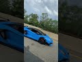 Blu Nila Aventador SVJ Roadster Rolling On The Highway