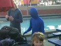 Silly Child in Blue Morph Suit Dancing