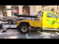 Video shows tow truck try to latch onto moving car in San Francisco