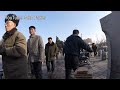 NORTH KOREA | CYCLING ACROSS ICONIC BRIDGE IN PYONGYANG