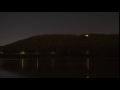 Turkey Mountain lighting up from across the Arkansas - proposal