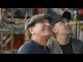 Lars Ulrich gives Brian Johnson a tour of Metallica HQ