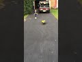 Children’s yellow dump truck down hill