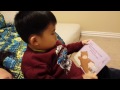 Skyler reading his bedtime story book