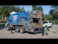 Allied Waste Mack LEU Mcneilus rear loader on residential recycling route.