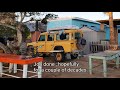 Land Rover Defender suspension replacement on the road at campsite, Baja peninsula, Mexico.