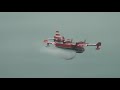 CL-415 Canadair or Bombardier Water Bomber pick up and water drop