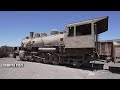Abandoned steam locomotives at a train depot in the desert | URBEX