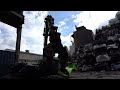 The process of crushing everything. A Japanese factory recycling cars and appliances.