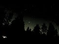 Camping time lapse stars and trees