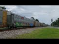 A fully loaded Auto train (freight). with lightning strike!