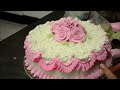 Chef Making a Pink Birthday Cake in Bakery