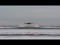 Emirates A380 snowy takeoff at JFK