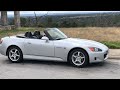 Honda S2000 silhoutted alongside the Texas Hill Country