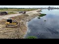 Amazing SHANTUI DH17c2 Bulldozer push gound hard &Pouring soil Landslides near the shore of the lake