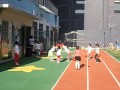 Chinese Schoolchildren Do a Traditional Dance