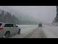 25min of driving on Coquihalla Hwy from rain to heavy snow