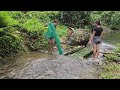 Two sisters went up to the stream to make traps to catch fish and then sell them