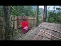 Bamboo kitchen construction and thatched roof complete the entire house