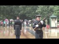 changing of the guard at tomb of unknown during thunder storm.