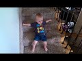 Ryan dancing on the stairs