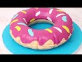 Donut Pool Floaty Cake (step-by-step on sugargeekshow.com)