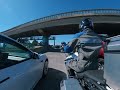 Motorcycle lanesplitting through heavy traffic (San Francisco Bay Area)