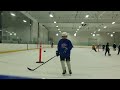 Ethan skating with coach Larry Baron