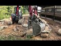 Building A Beautiful Rock Retaining Wall Behind The Cabin!