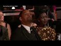 Watch the uncensored moment Will Smith smacks Chris Rock on stage at the Oscars, drops F-bomb