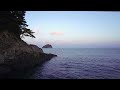 [4K] A view of Jeju with a small island in the distance