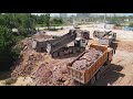 Amazing Skill Push Much Stone To Landfilling By KOMATSU DOZER Driver Show Technique With Dump Trucks