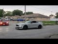 Cars leaving the 2023 Gretna Days Car Show in Gretna, Nebraska