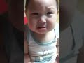 cute asian baby laughing and then crying