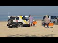 FJ Cruiser recovers Landcruiser + Caravan on the beach