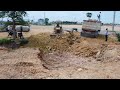 Good skill 2 Dozer pushing soil into deep sewer pit To create residential land