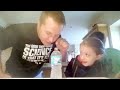 Dad plays water bottle magic trick on kids