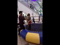 Mason jumping at the mall