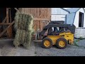 Making dry grass hay in big bales