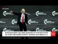 'It's Tough In There': Peter Navarro Details Time In Prison During Turning Point Summit Remarks